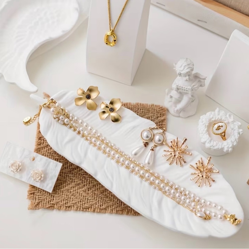 White ceramic feather